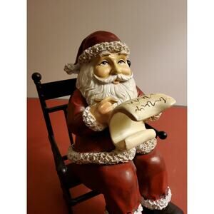 "Checking the List" - Santa Figurine  in a Rocking Chair